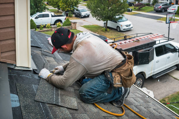 Professional Roofing technician working in Olga, WA